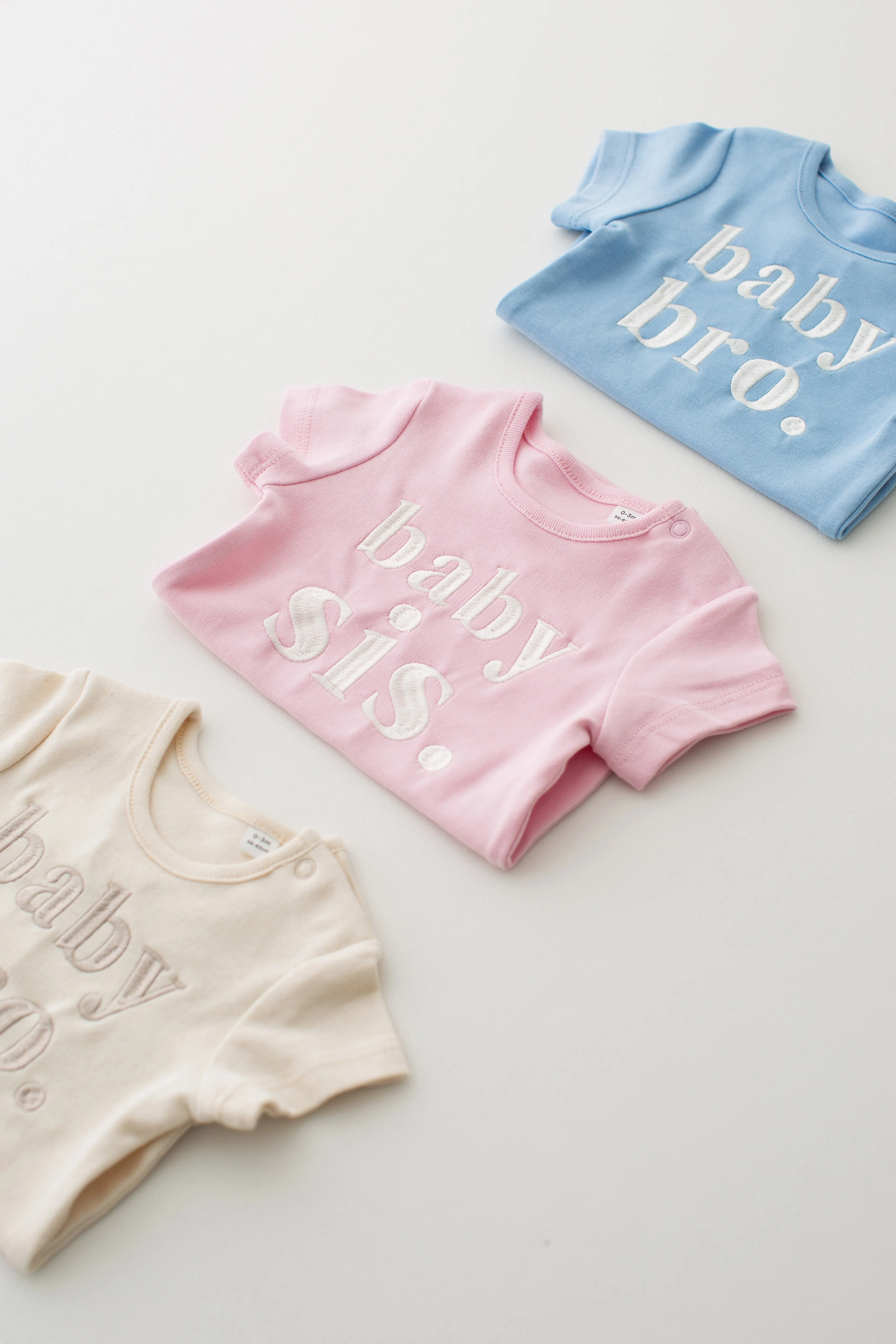 baby bro/sis Signature Baby Bodysuit