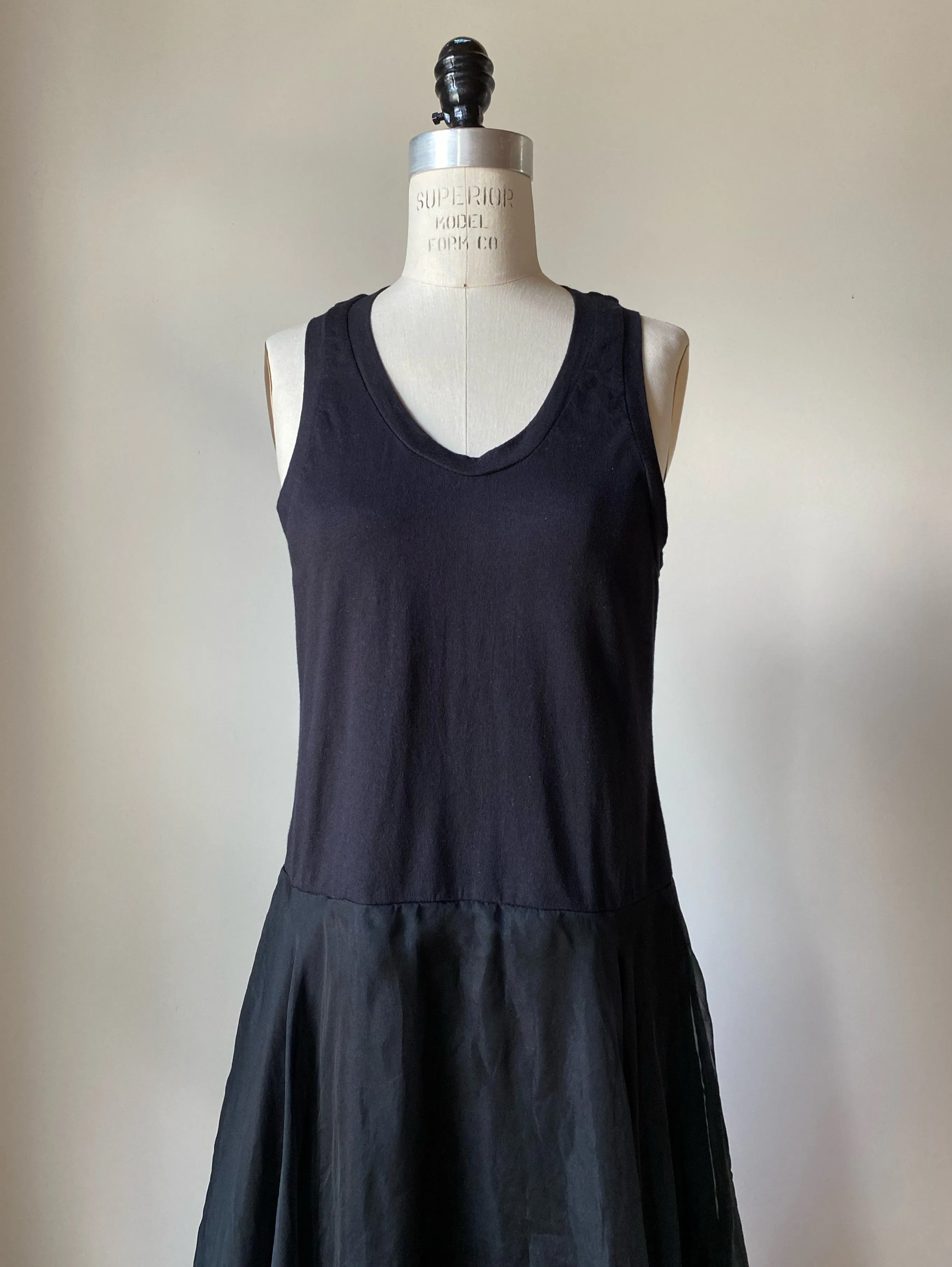 black tank slip dress with organza pin tucked skirt