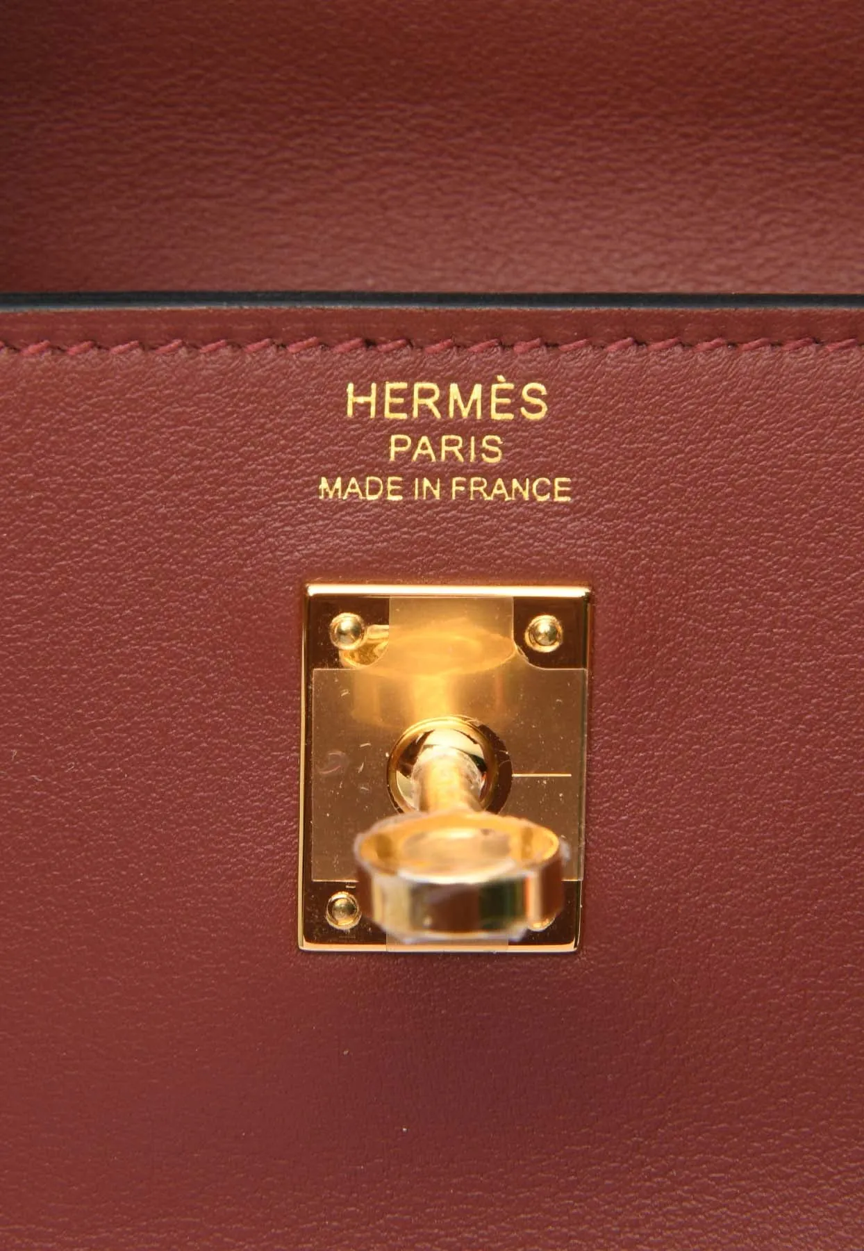Kelly Moove in Rouge H Swift Leather with Gold Hardware