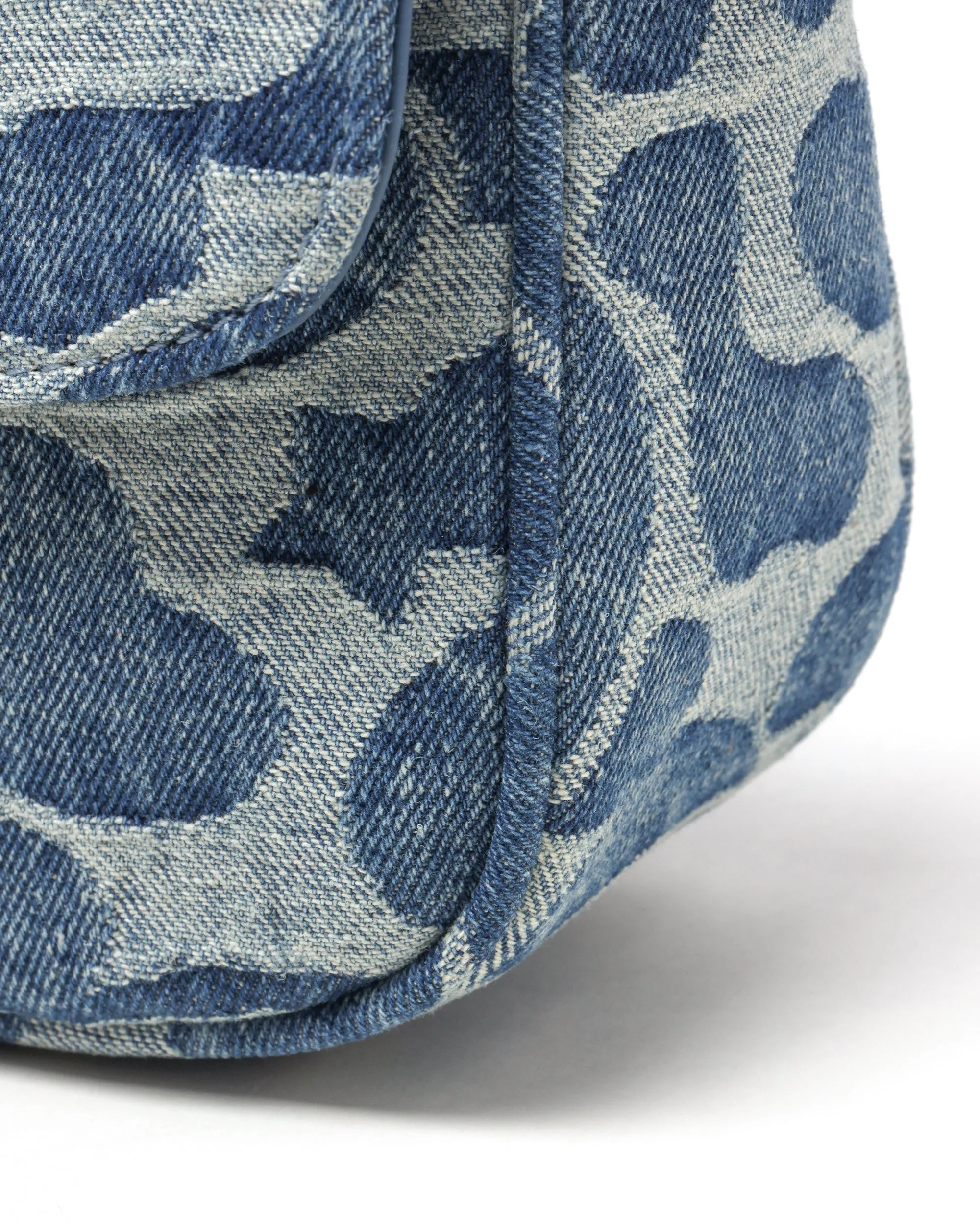 Moonface pattern denim handbag