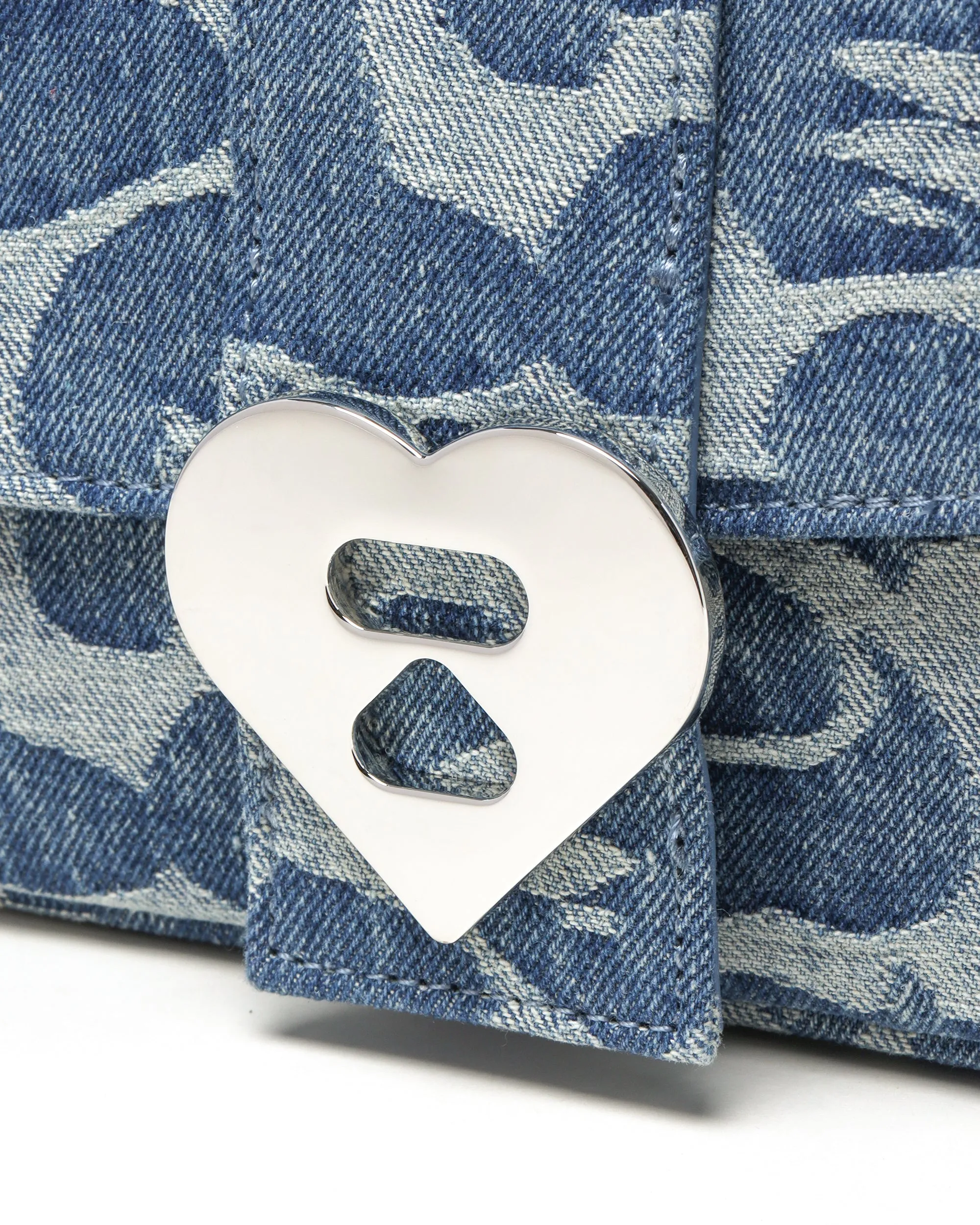 Moonface pattern denim handbag