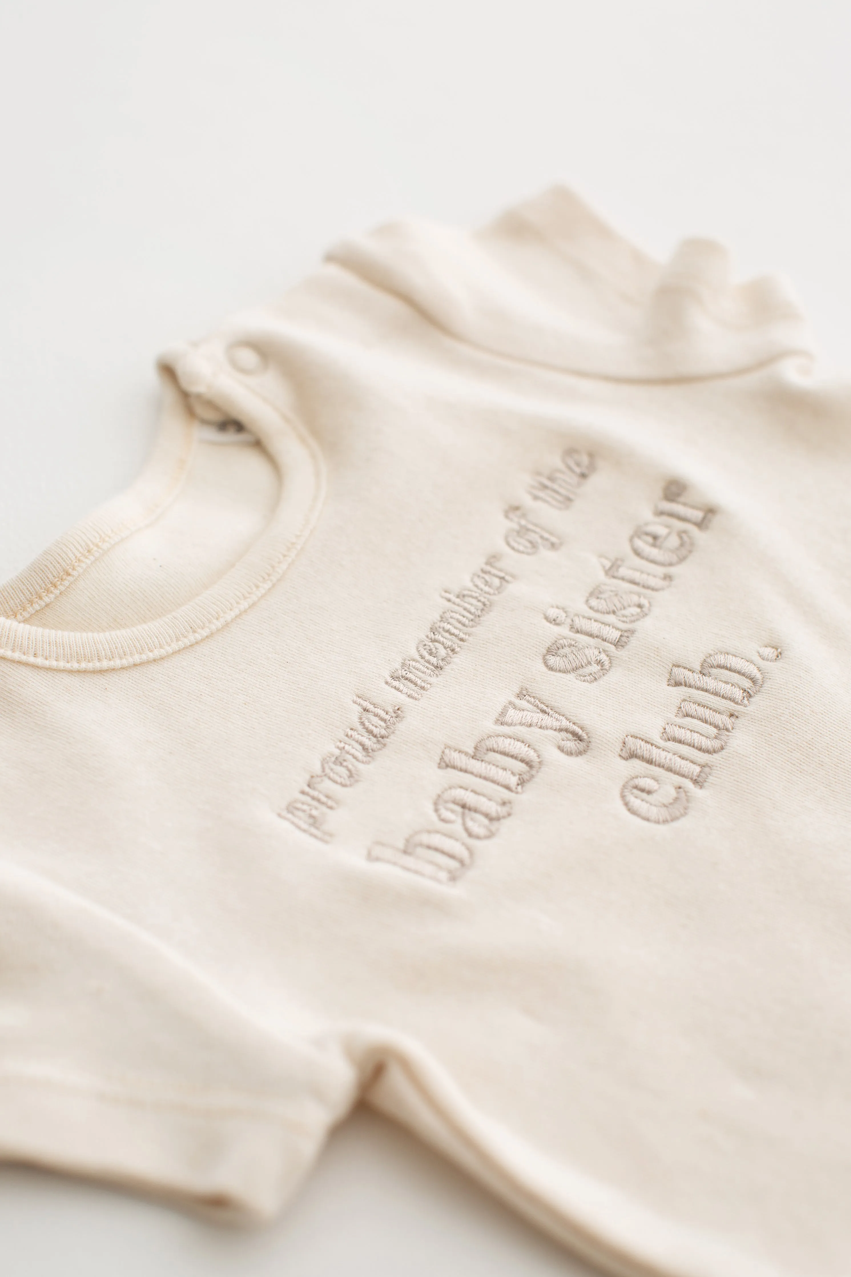 Proud member baby sibling Signature Baby Bodysuit
